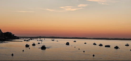 Sunset over boat moorage in Arcachon