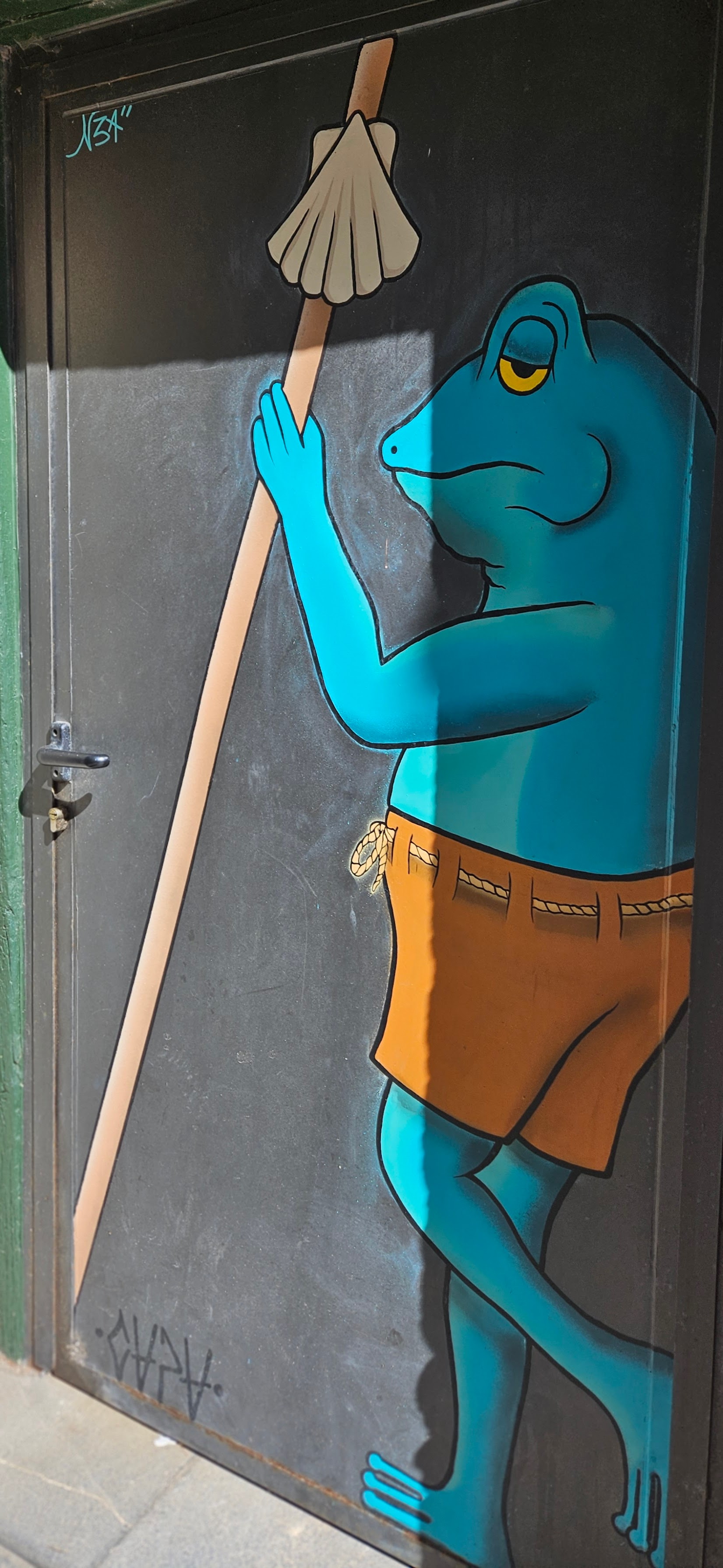 Street art: Frog pilgrim with staff