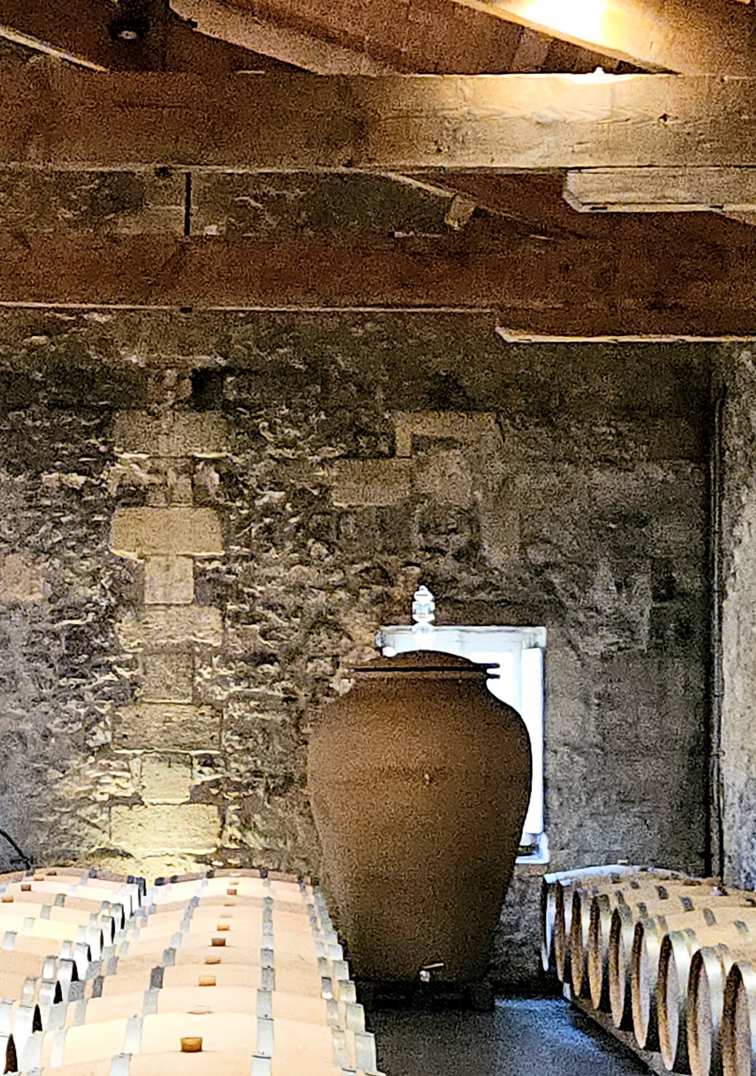 Wine barrels and concrete urn