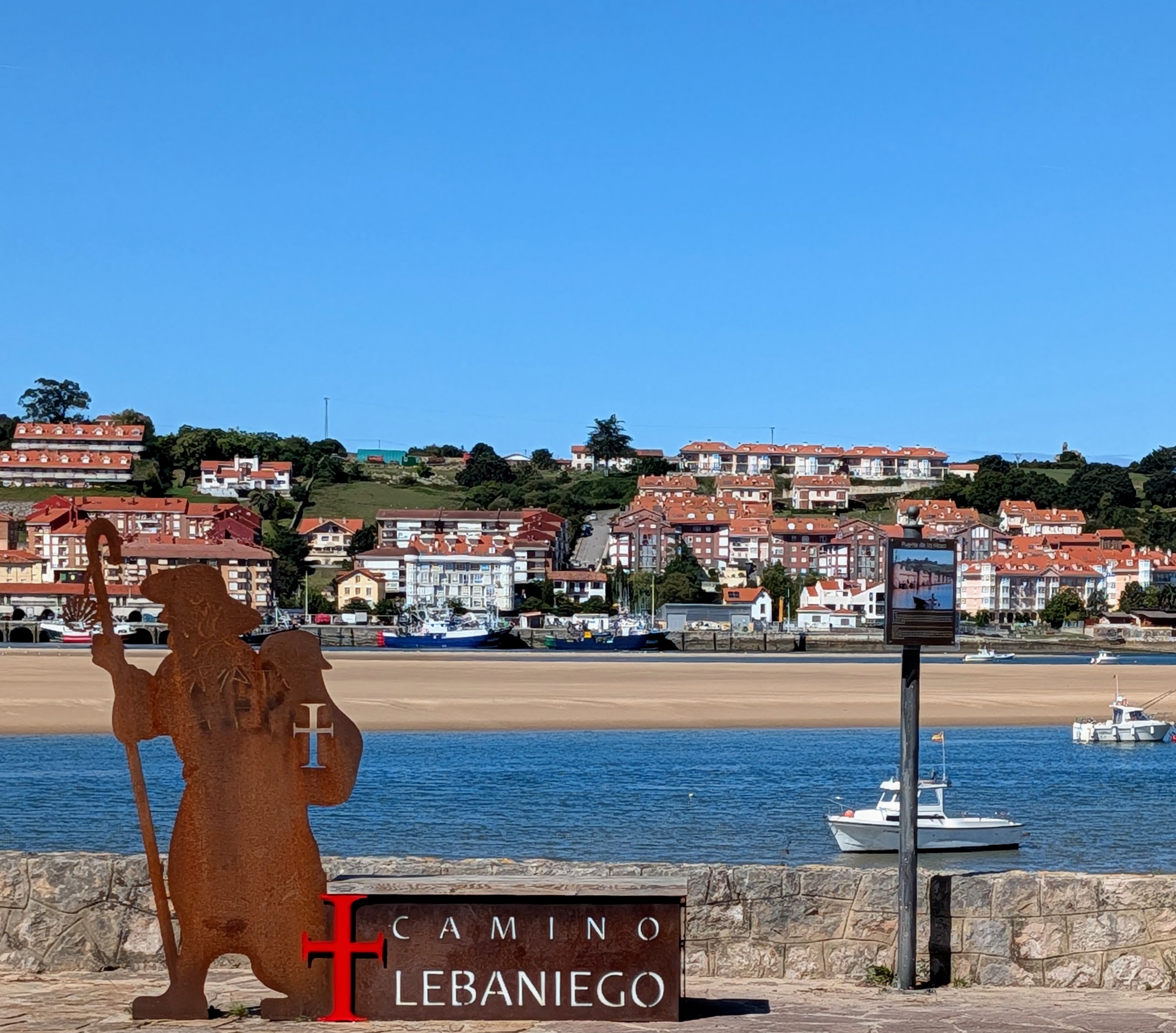 Way-post for the Camino Lebaniego on the Puente de la Maza