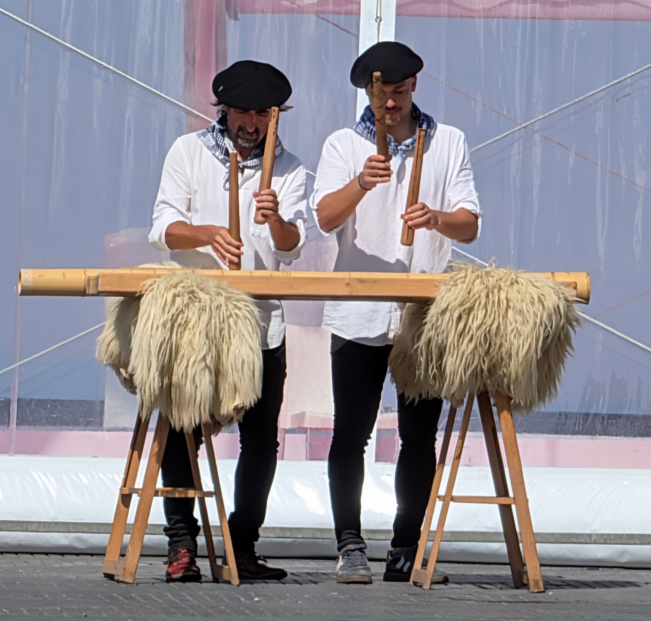 Street performers playing a txalaparta traditional Basque instrument