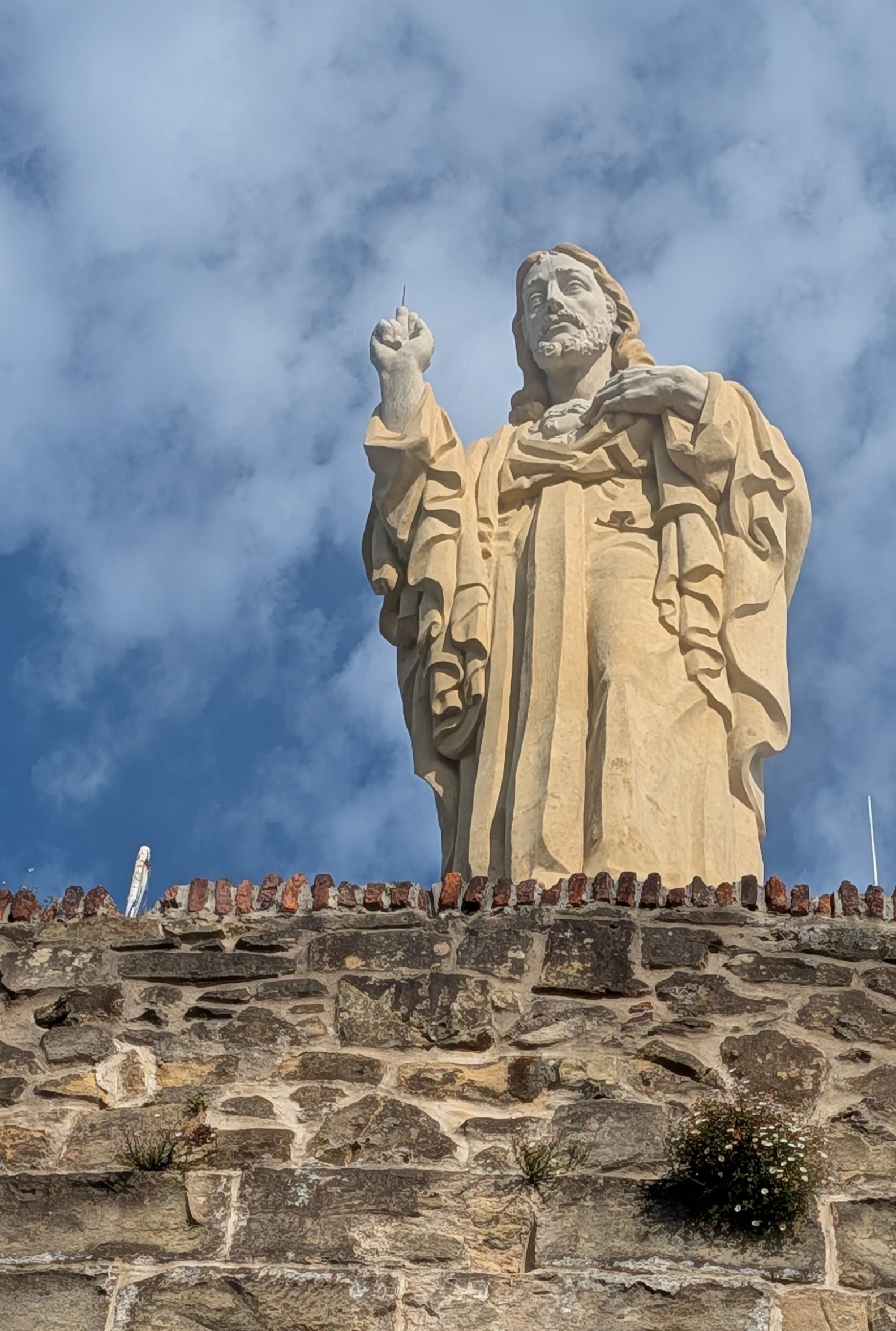 Jesus watches over Mota Castle at the top of Urgull