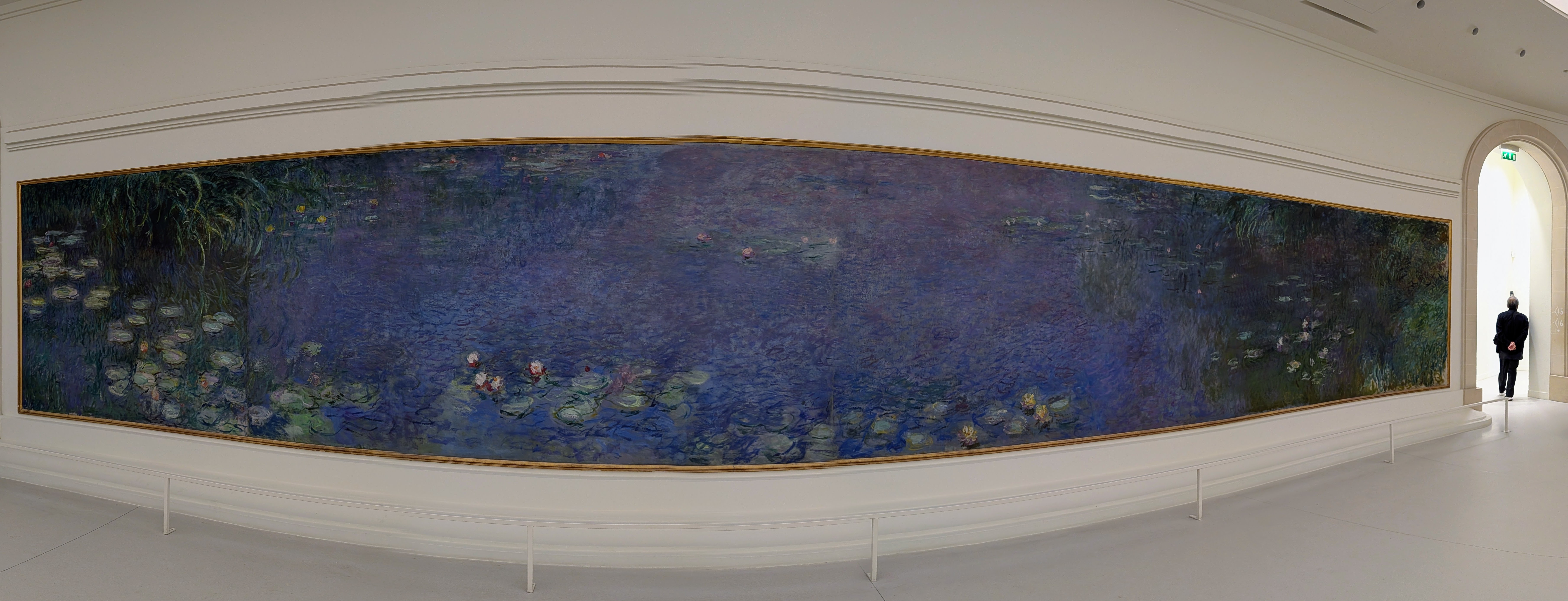 Panorama of one wall of water lilies at l'Orangerie