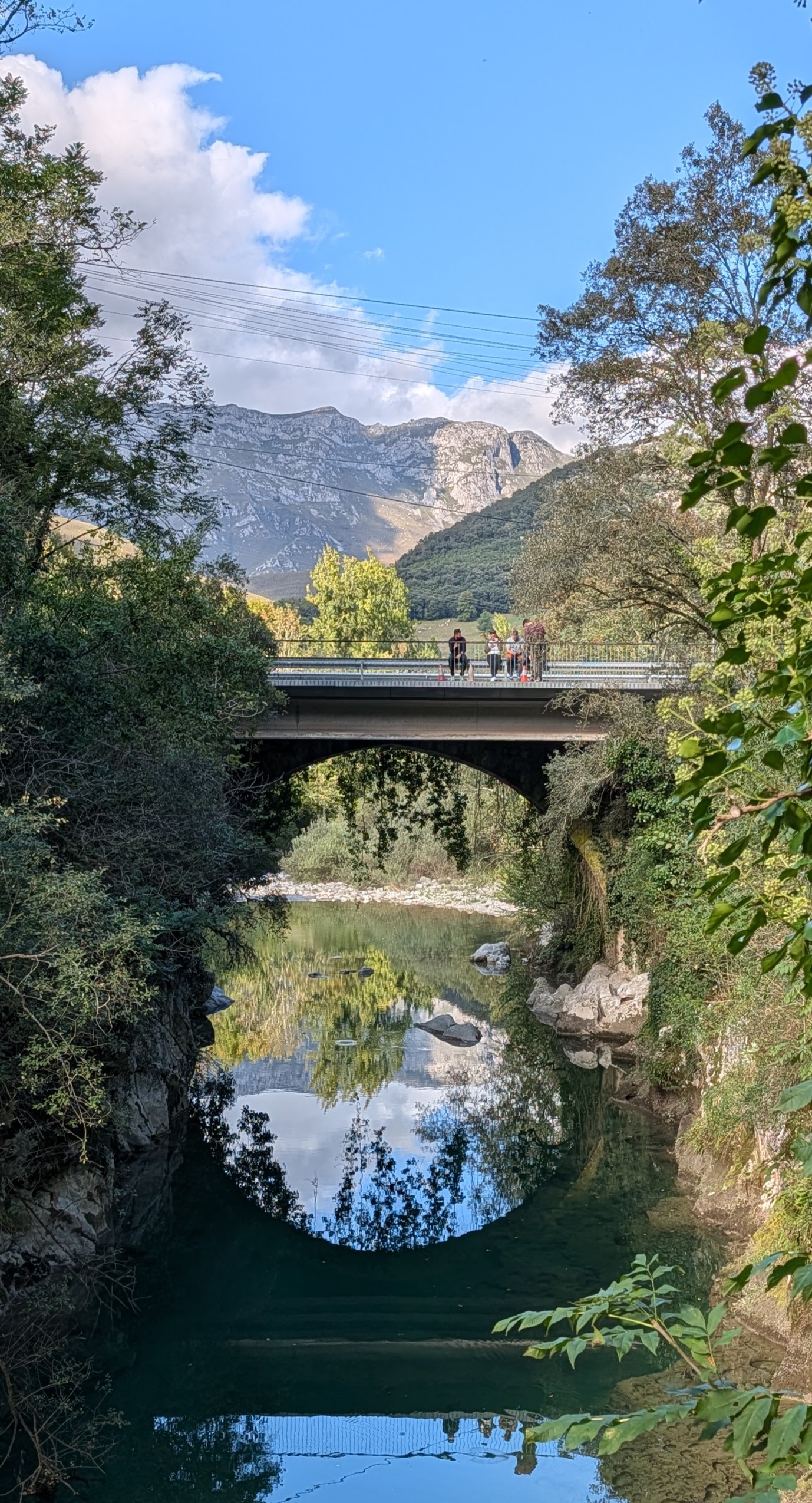 Bridge and reflection with mountain view