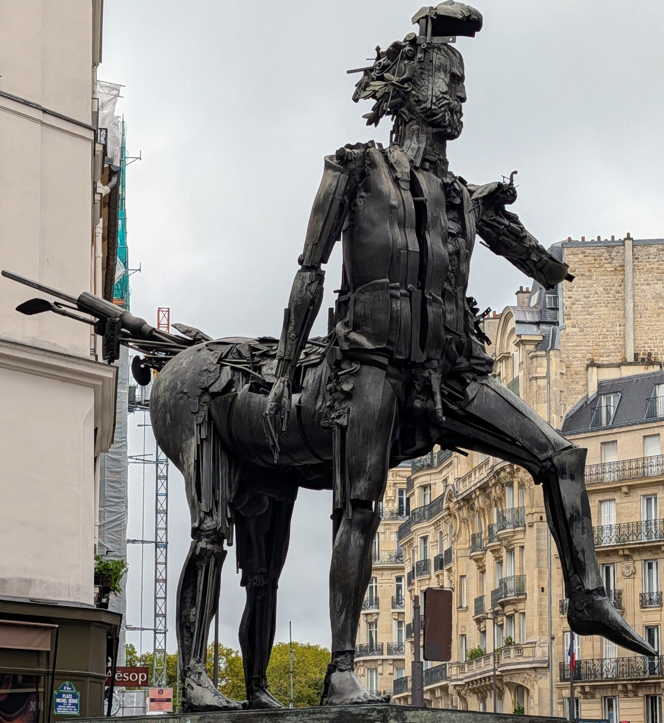 Metal sculpture of an almost-centaur