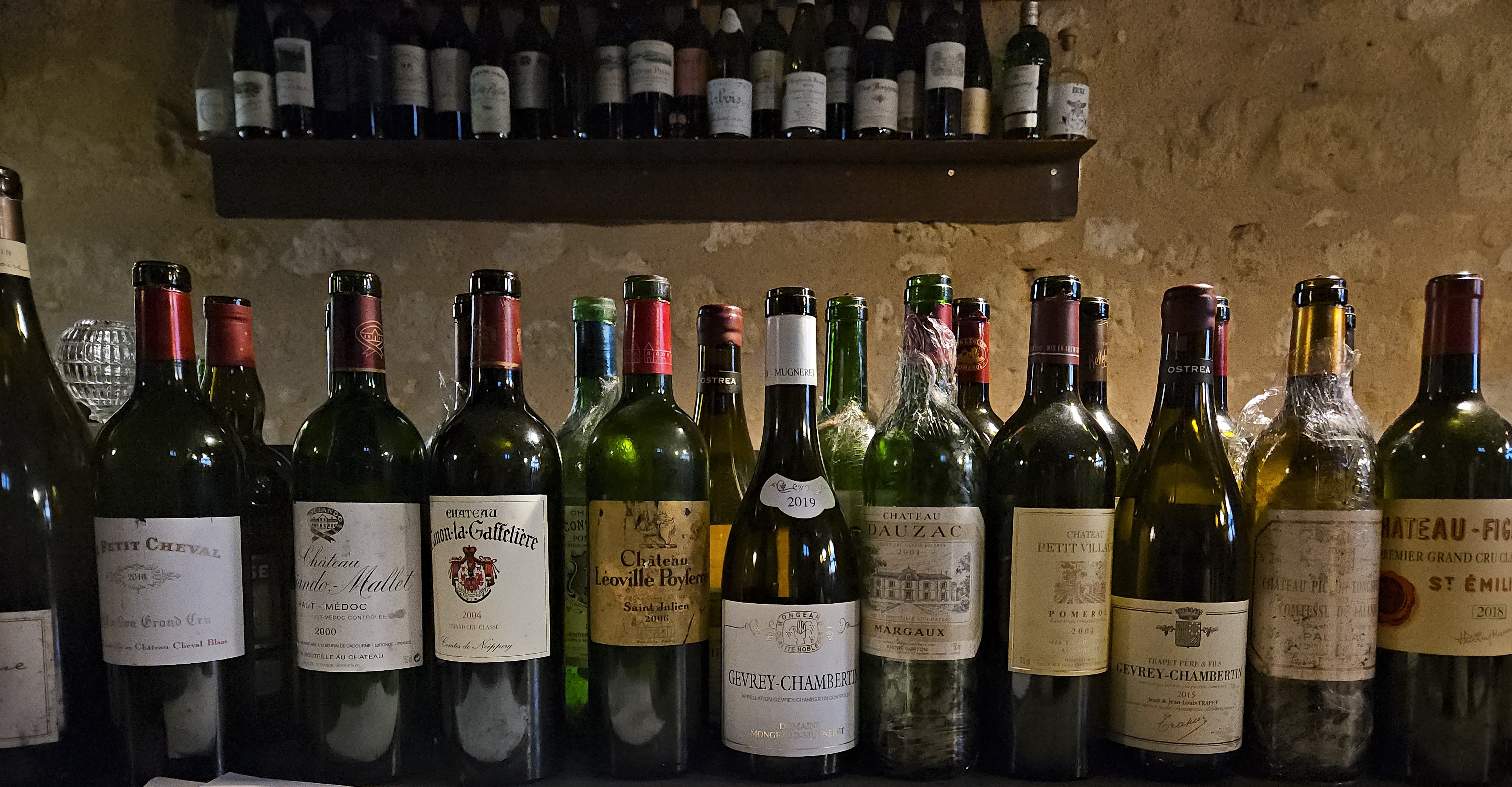 Lineup of Bordeaux wine bottles