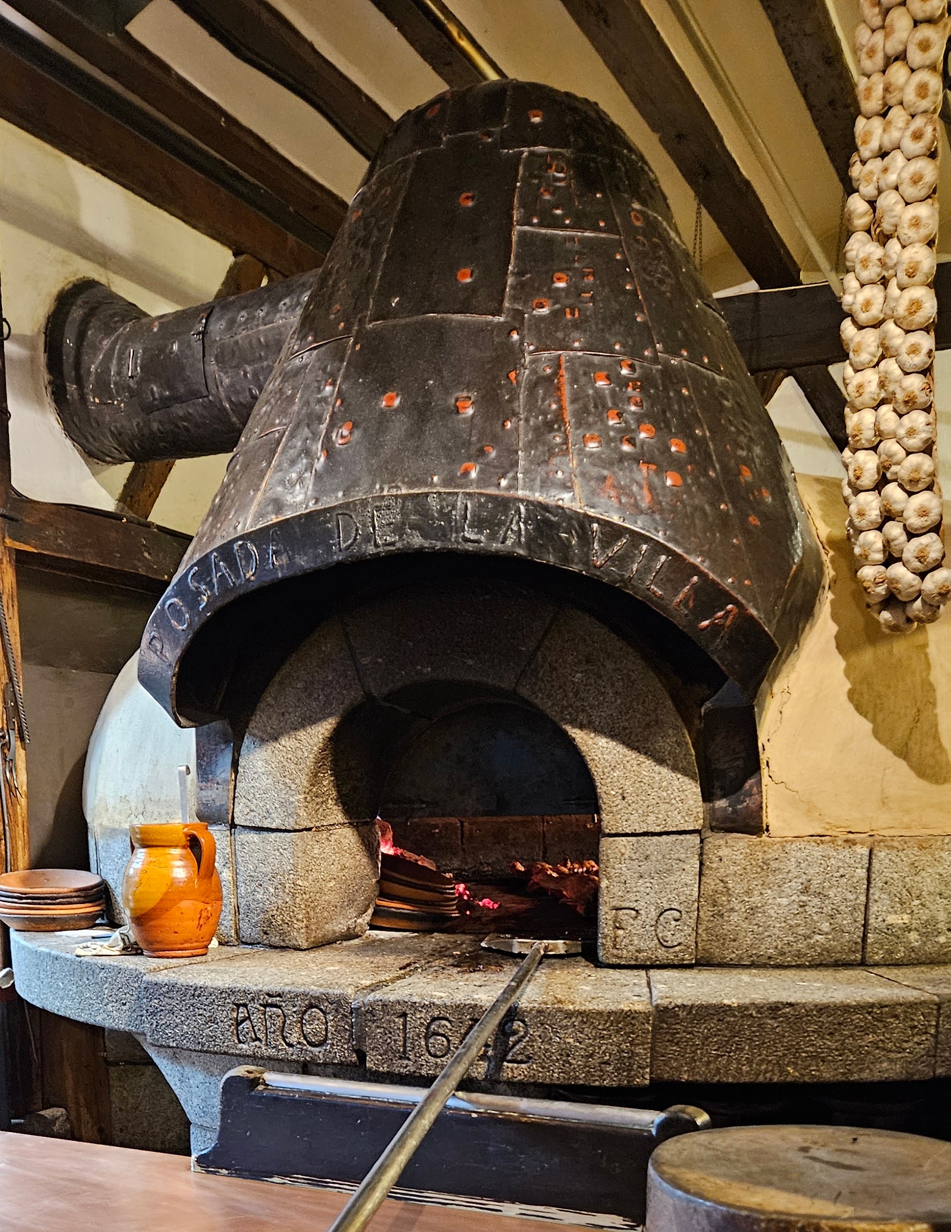 Posada de la Villa's wood-fired oven, inscribed 1642