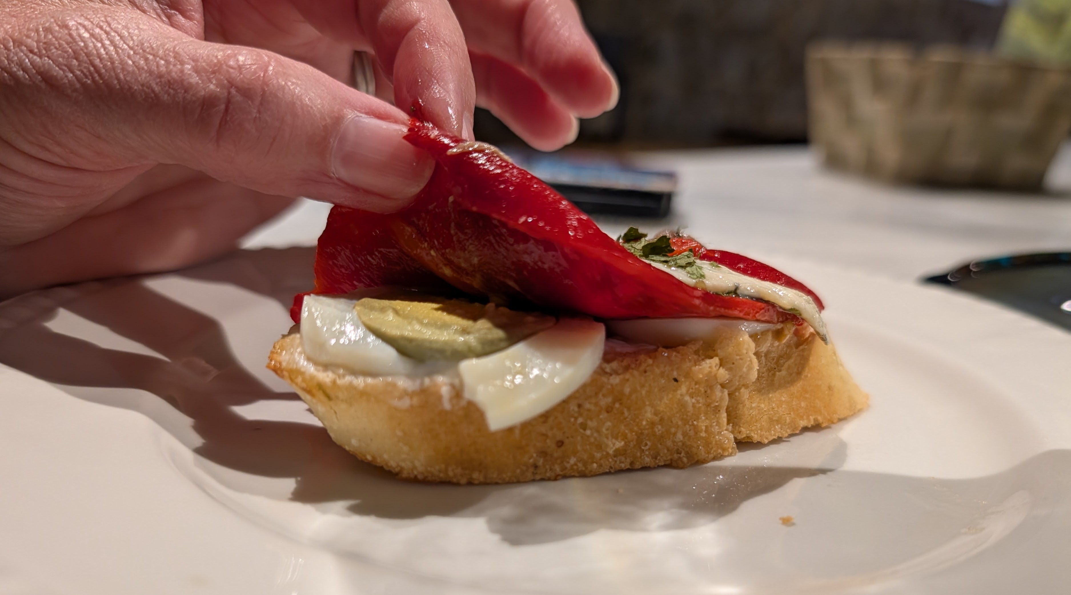 Pinxto with roasted red pepper and boiled egg