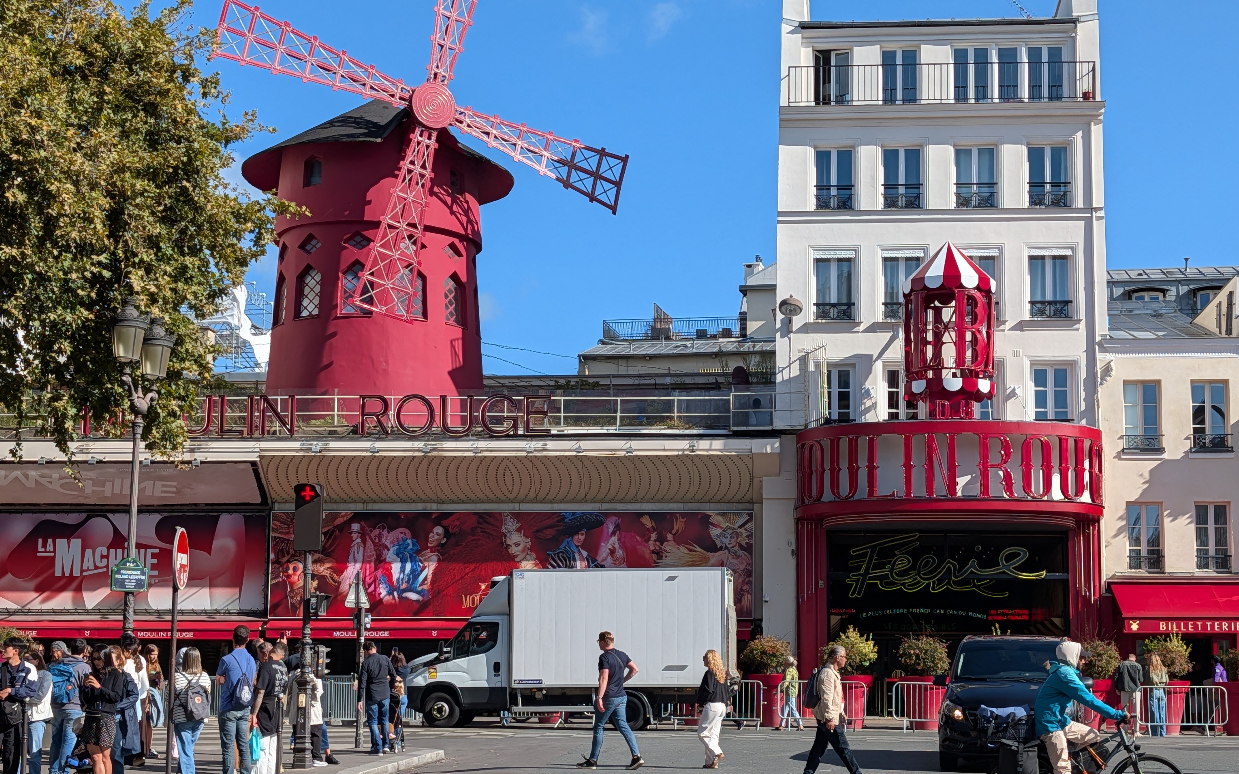 In front of the Moulin Rouge