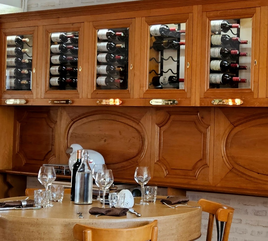Individual-owner wine storage cabinets. Restaurant Le Lion d'Or, Arcins, France